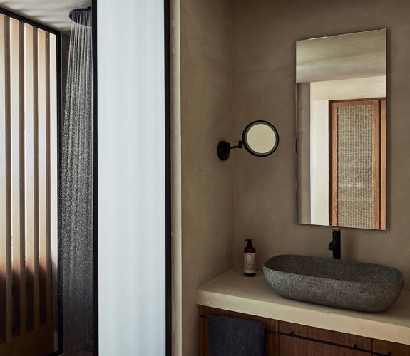 Zelia Resort Halkidiki Panorama Suites Sea View shower, washbasin, a big mirror and a small round one
