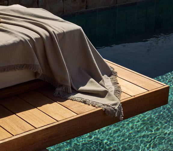 Zelia Resort Halkidiki Signature Suite Private Pool sunbeds on a wooden dock above the pool
