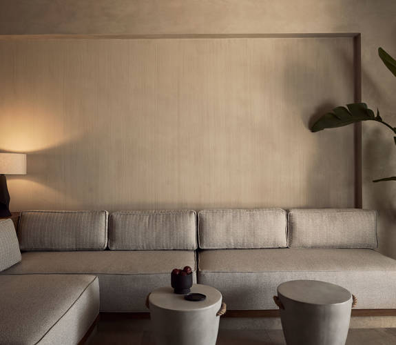 Zelia Resort Halkidiki Signature Suite Private Pool big sofa, two small round tables and decorations
