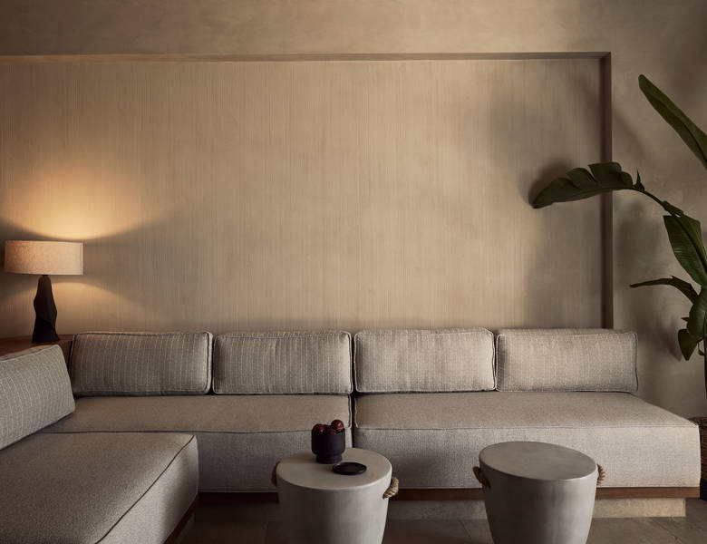 Zelia Resort Halkidiki Signature Suite Private Pool big sofa, two small round tables and decorations
